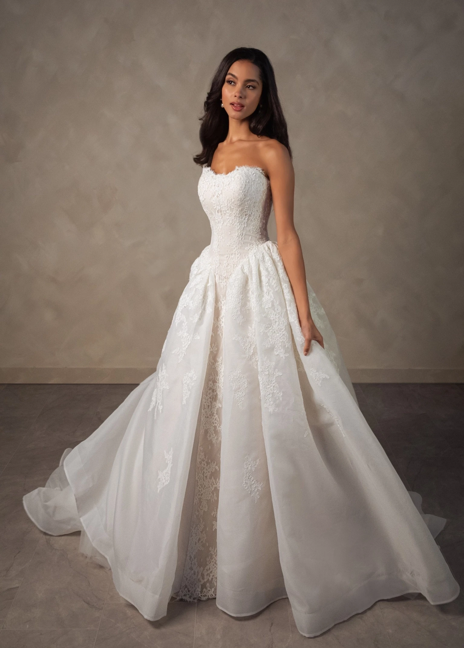 Model wearing a Essense of Australia gown