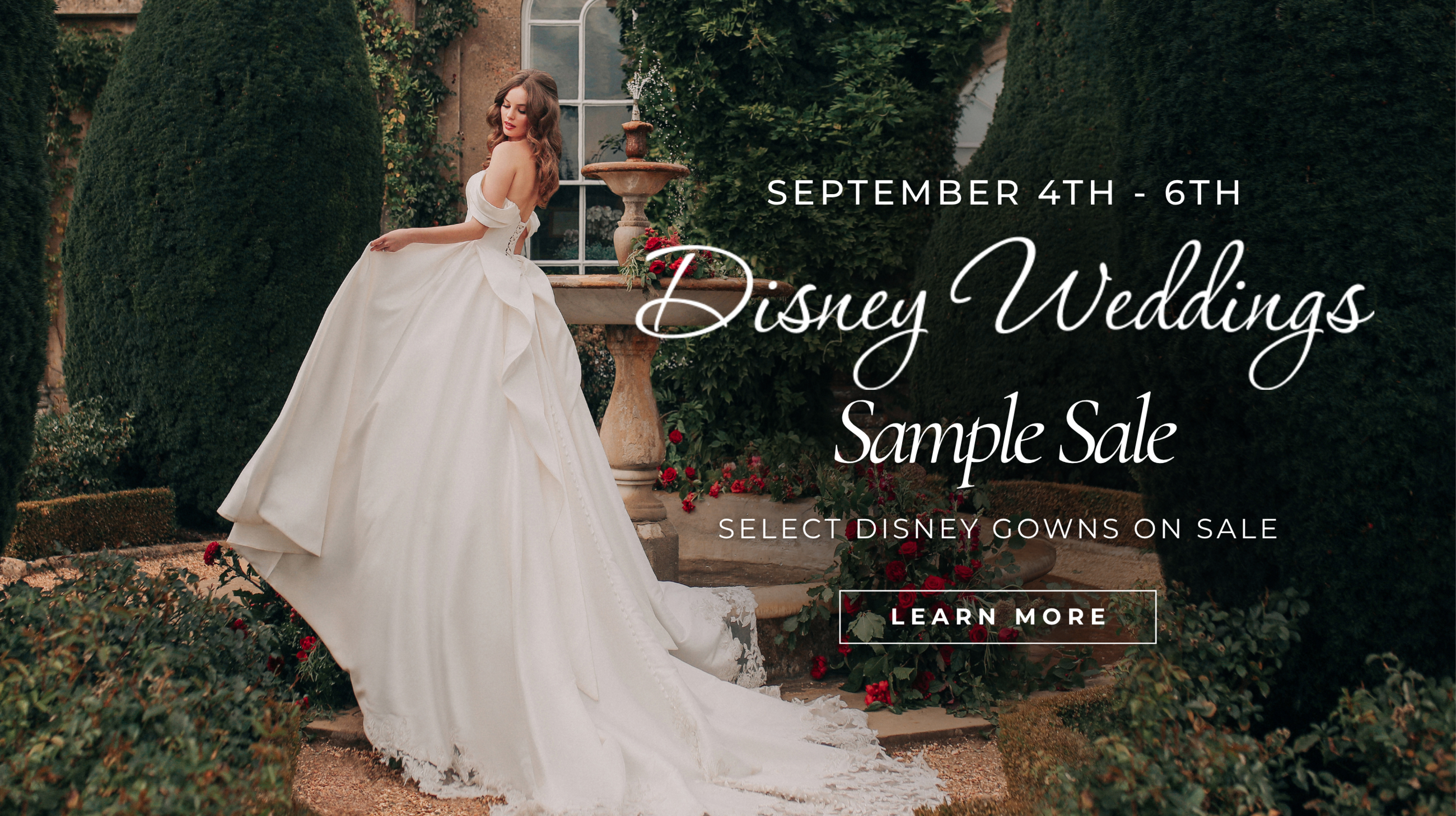 Disney Sample Sale - Model Standing on Fountain in a Belle Inspired Wedding Dress